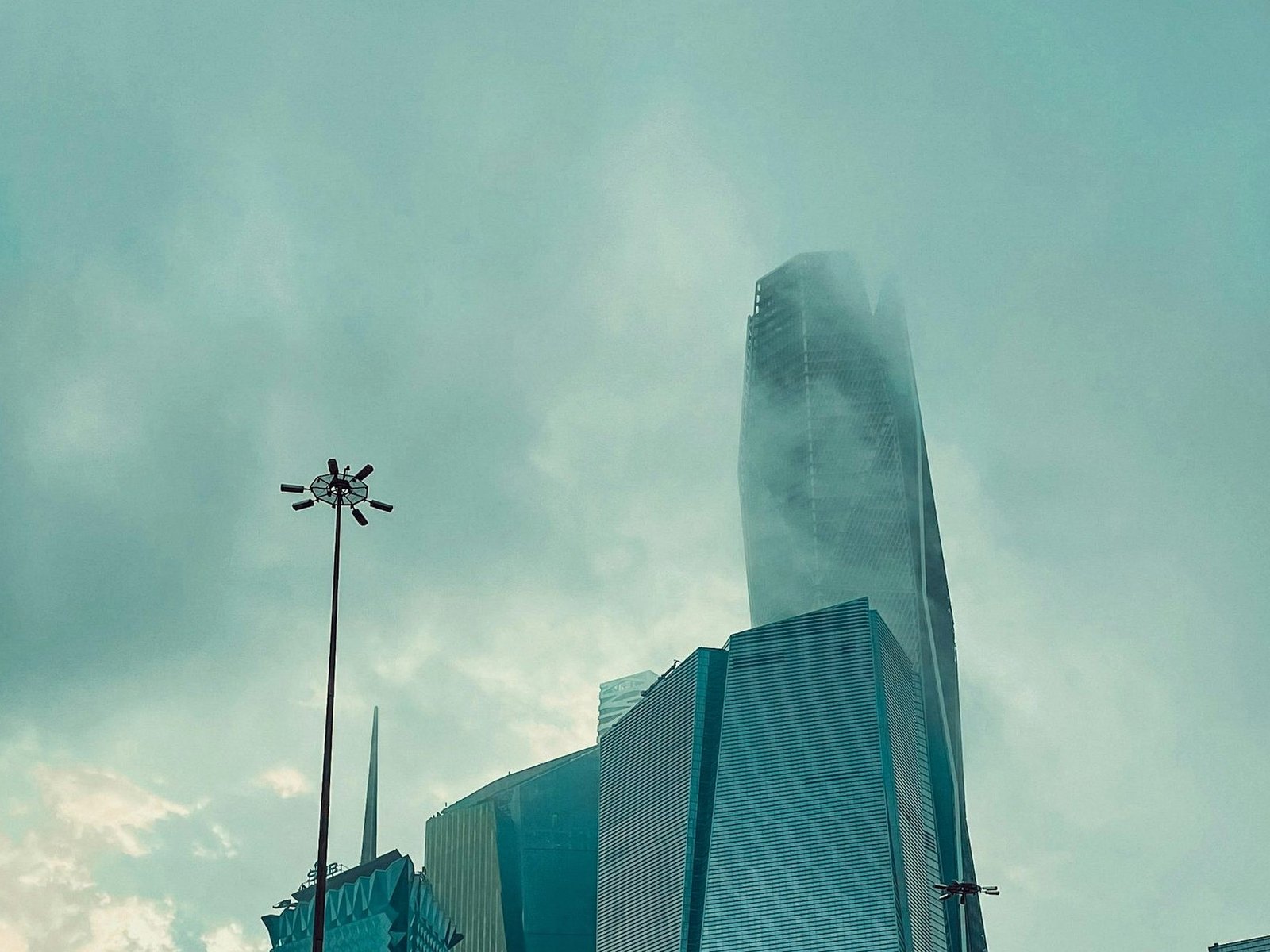King Abdullah Financial District towers in Riyadh under a calm overcast sky